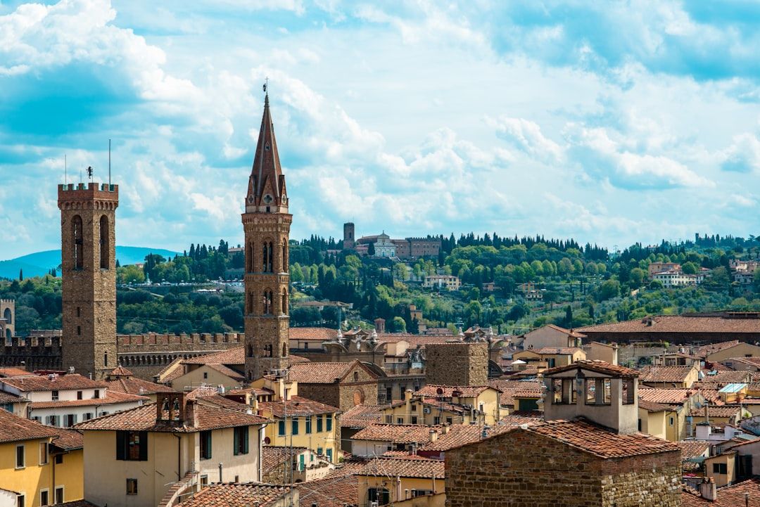 Florence Duomo dome rising above terracotta rooftops of the historic centre